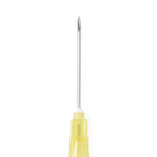 Sterile hypodermic needle with yellow hub for medical injections on white background