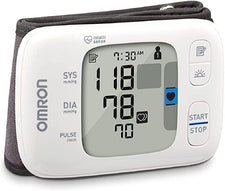 Digital blood pressure monitor with cuff, displaying systolic, diastolic, and pulse readings