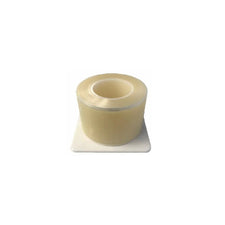 Clear medical adhesive tape roll on white background for wound care and bandages