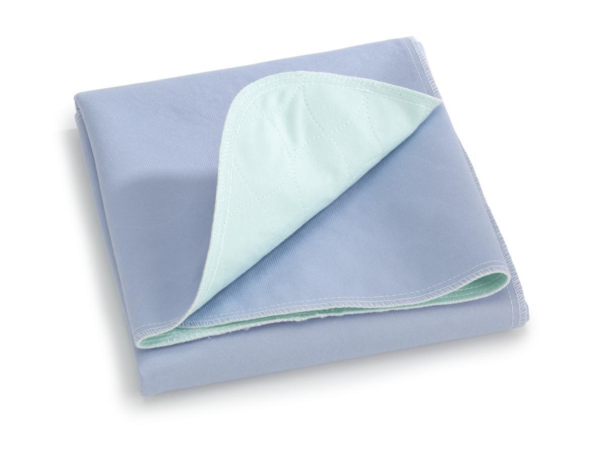 Folded light blue waterproof bed pad for incontinence or home care